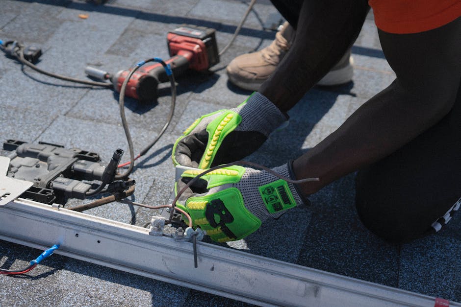 Solar panel installer working